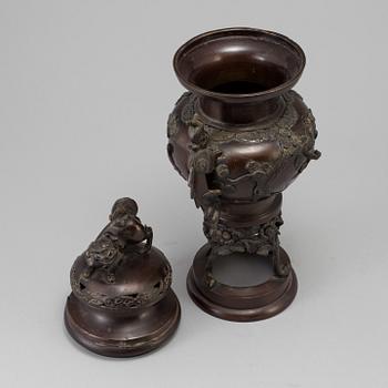 A Japanese bronze vase and cover, Meiji, late 19th century.