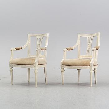 A set of two Gustavian arm chairs from the early 19th Century.