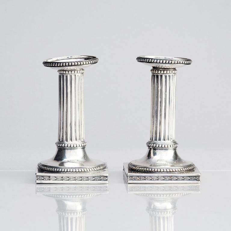 A Swedish pair of 18th century Gustavian silver candlesticks, marks of Johan Ekholm, Stockholm 1795.