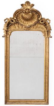A Rococo mirror, 18th century.
