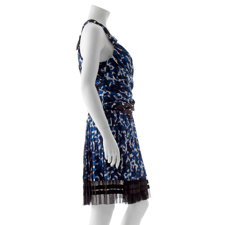 LOUIS VUITTON, a blue and white silk dress, from the 2010 cruise collection.