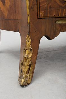 A 1700s rococo commode.