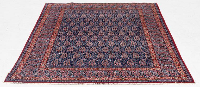 A semi-antique Qum rug, approx. 212 x 139 cm.