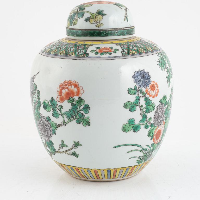 A famille verte Kangxi style porcelain jar with cover, Qing dynasty, 19th century.