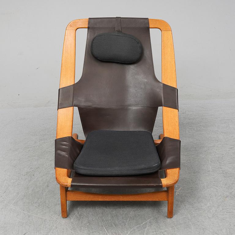 ARNE TIDEMAND RUUD, a teak and leather 'Holmenkollen'/'3030' easy chair, A/S Inventar, Gjövik, 1960's.