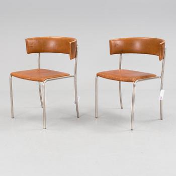 A pair of Erik Karlström leather upholstry chairs, circa 1965.