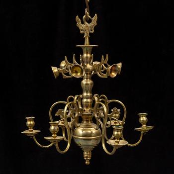 A brass baroque style chandelier, 19th century.