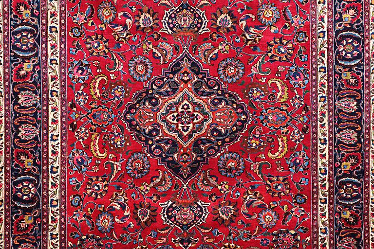 A carpet, Mashad, c. 335 x 251 cm.