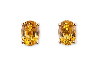 457. A PAIR OF YELLOW SAPPHIRE EAR STUDS.