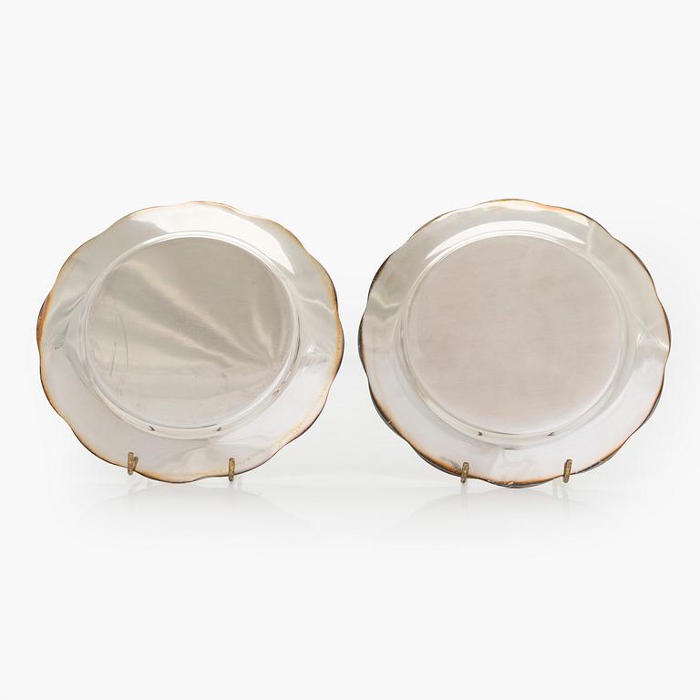 A 10-piece set of silver chargers, Kultateollisuus, Turku 1938 and 1980.