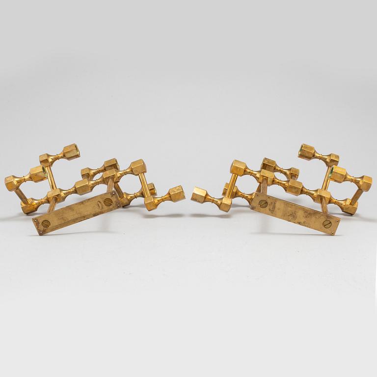 A pair of brass wall candelabras, for Gusum, signed BK and dated 1995 and 1997.