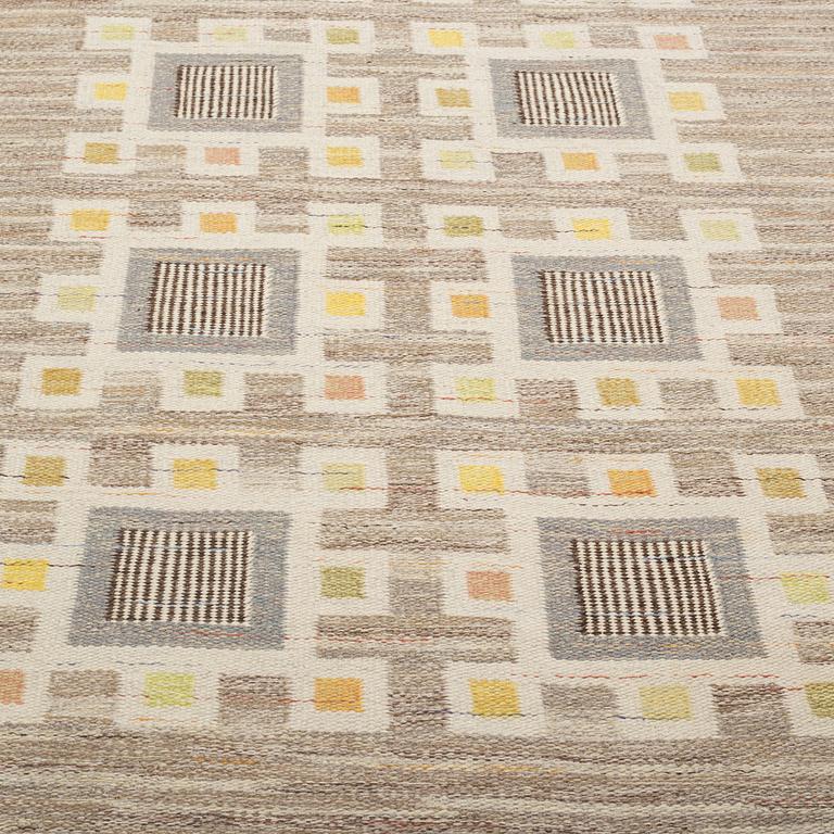 A CARPET, flat weave, around  214 x 121 cm.