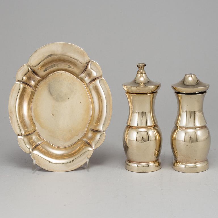 A pair of Tiffany & Co. silver-gilt sterling silver salt- and pepper grinder set.