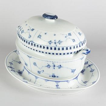 A 'Blue Fluted' porcelain tureen with cover and stand, Royal Copenhagen, early model, 19th century.