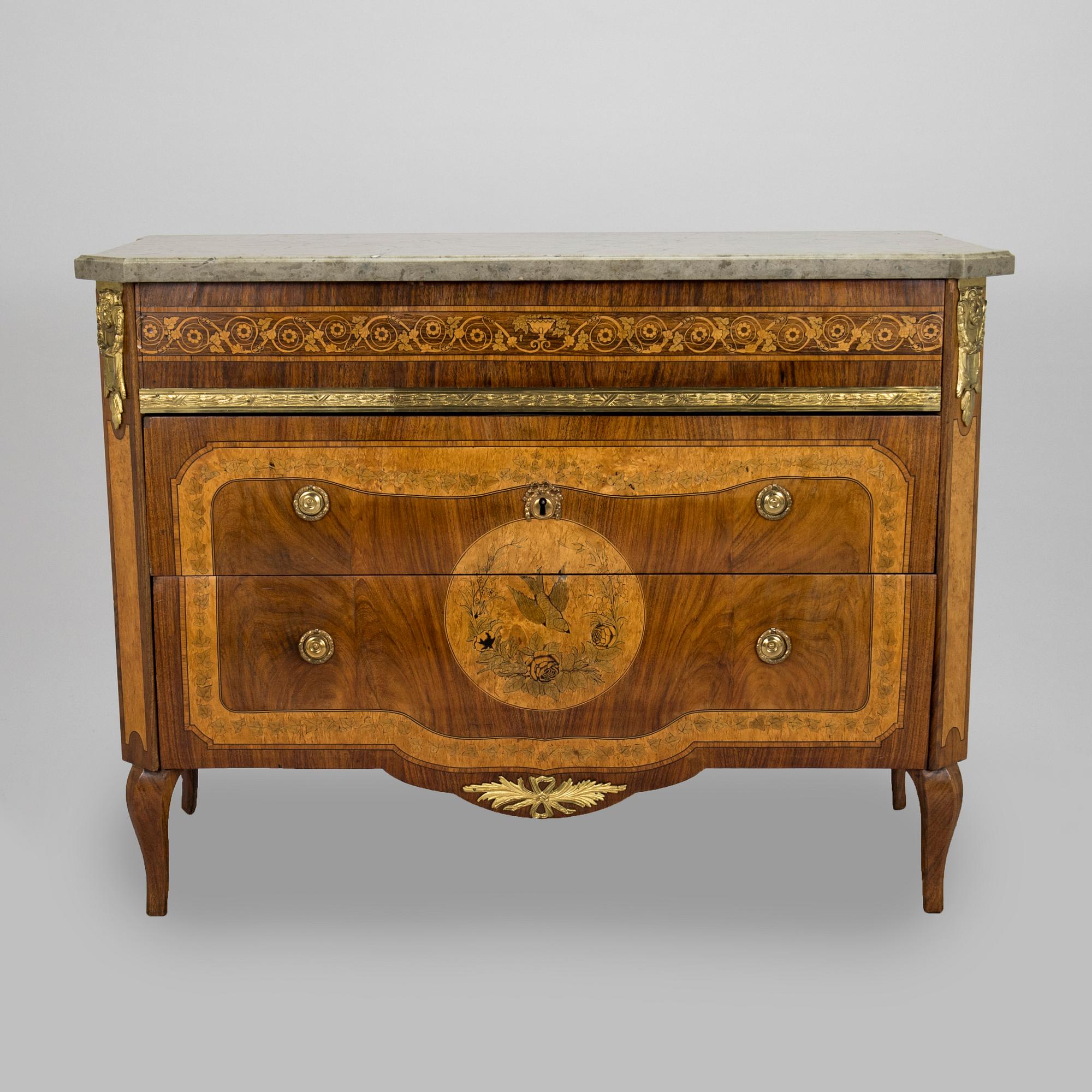 A Louis XVI style chest of drawers, second half of the 19th century.