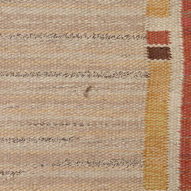 A flat weave carpet, c. 360 x 265 cm.