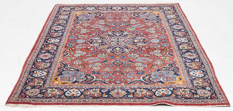 An oriental carpet, approx. 170 x 100 cm.