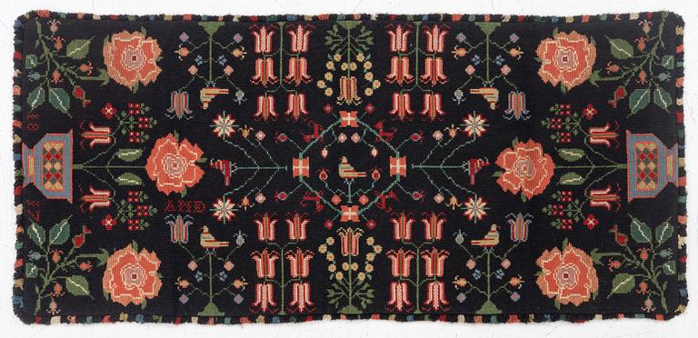 Åkdyna, korsstygnsbroderi, daterad 1817.