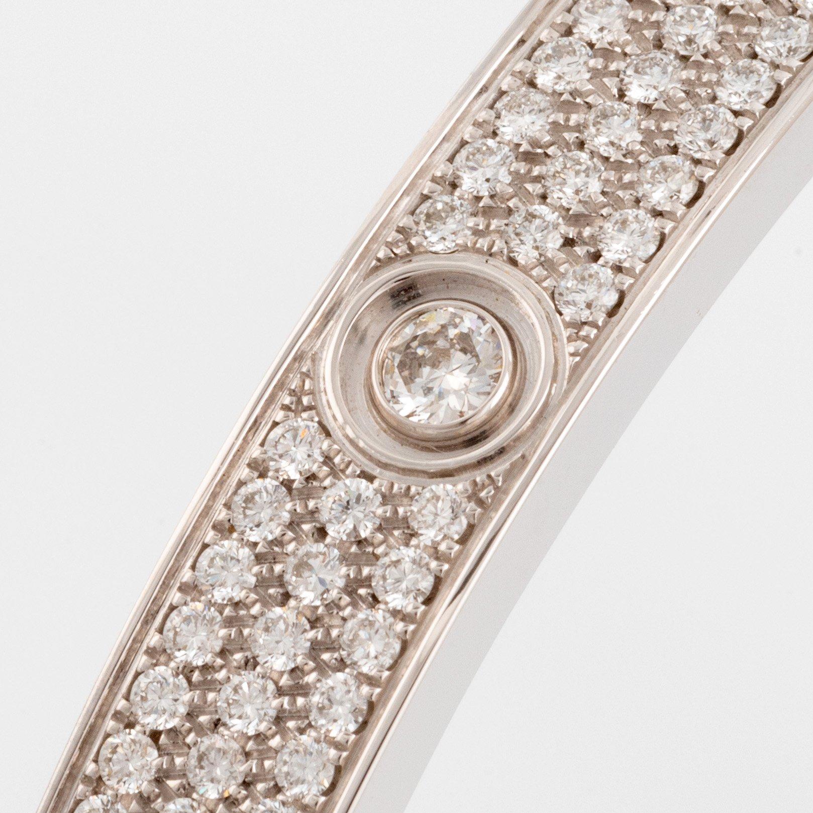 A Cartier "Love" bracelet in 18K white gold set with round brilliant-cut diamonds.