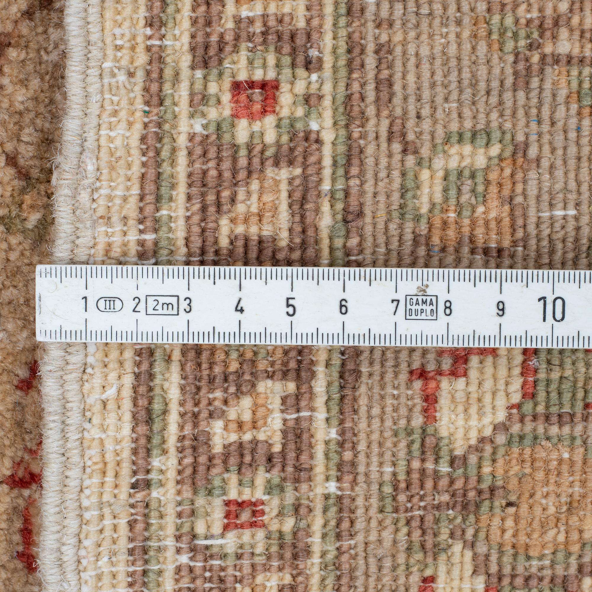 Two Zeigler design rugs, ca 84 x 61 cm.