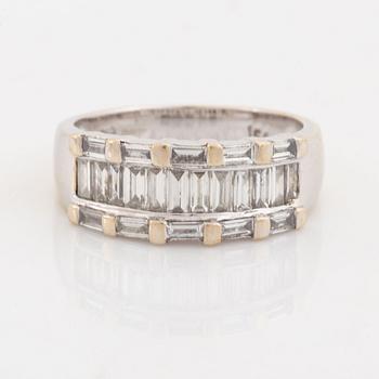 An 18K white gold ring set with baguette-cut diamonds.