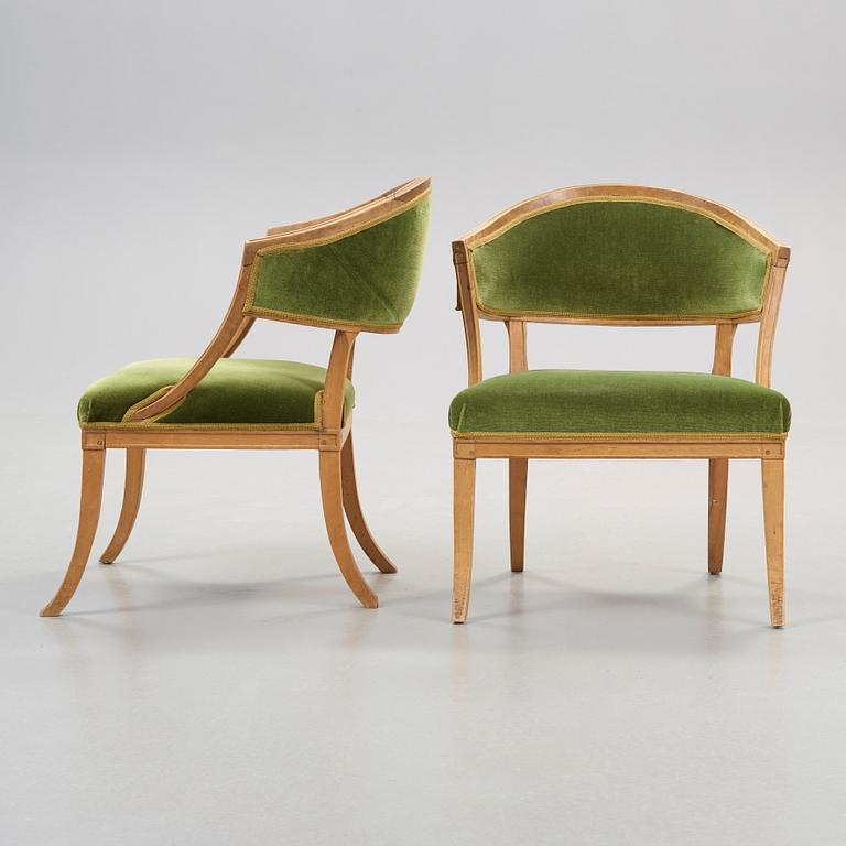 A pair of late Gustavian early 19th century armchairs.