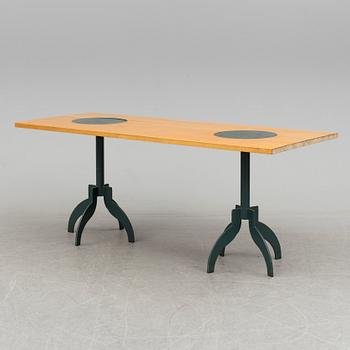 A "Triptyk" dining table by Jonas Bohlin for Källemo.