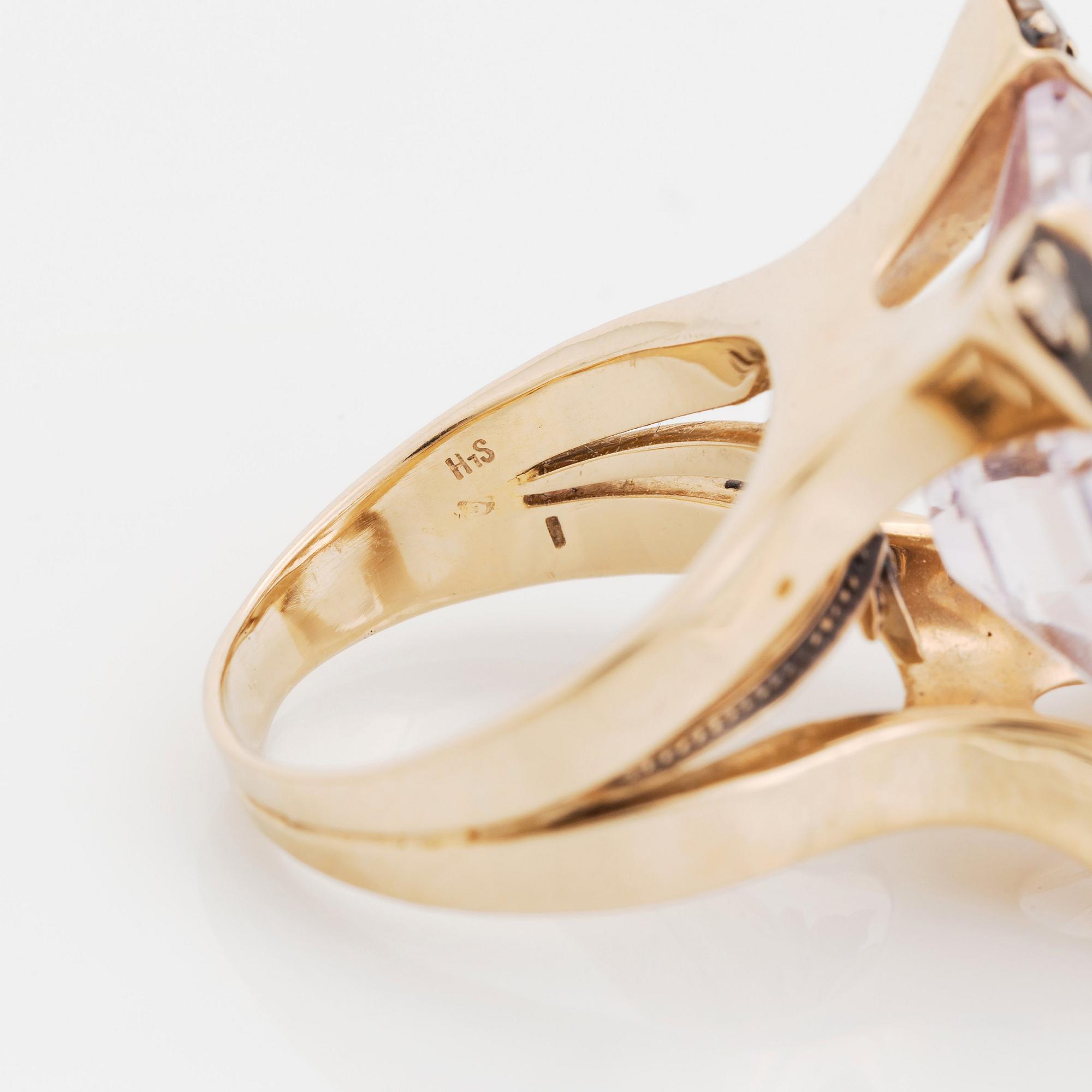 An 18K gold H Stern ring "Highlights" set with a faceted amethyst and round brilliant-cut brown diamonds.