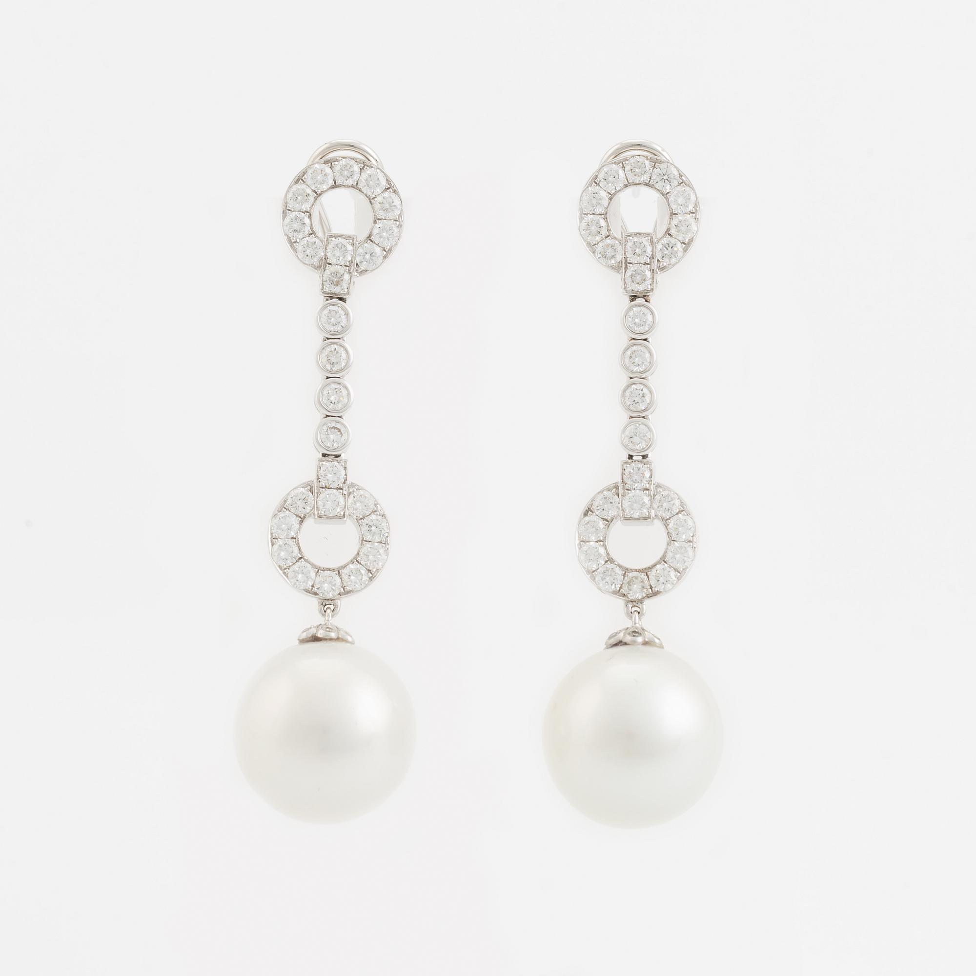 South sea pearl and brilliant cut diamond earrings.