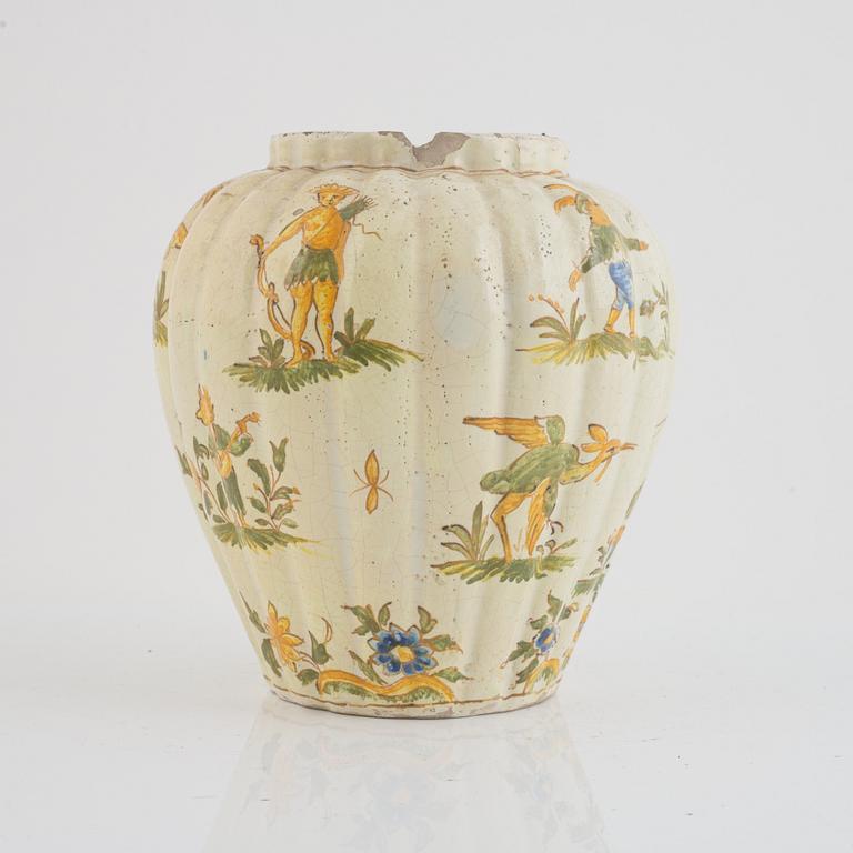 A faience pot, 18th century.