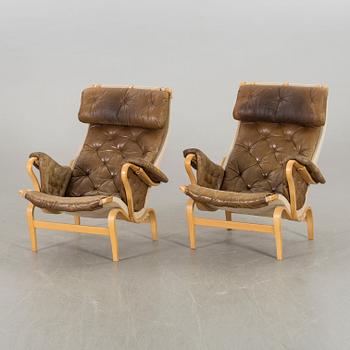 BRUNO MATHSSON, a air of Pernilla armchairs for DUX later part of the 20th century.