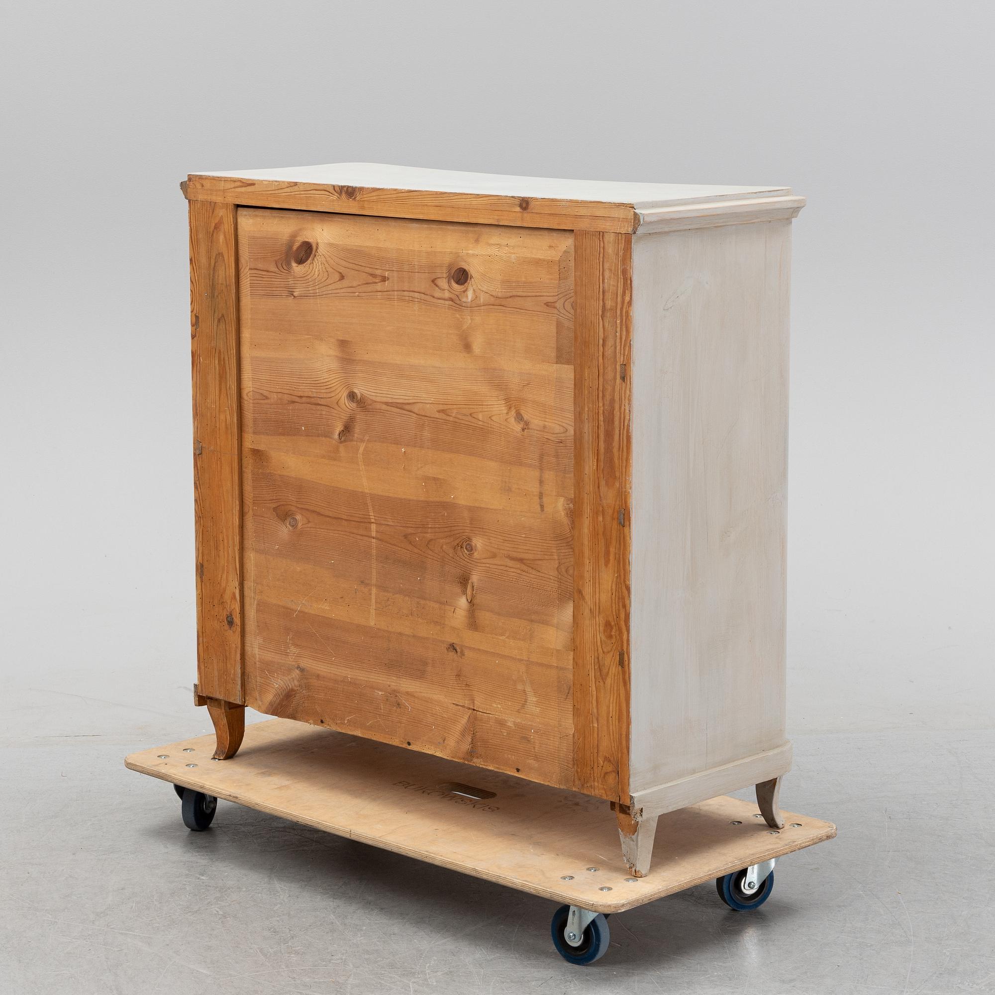 A painted chest of drawers, 19th Century.