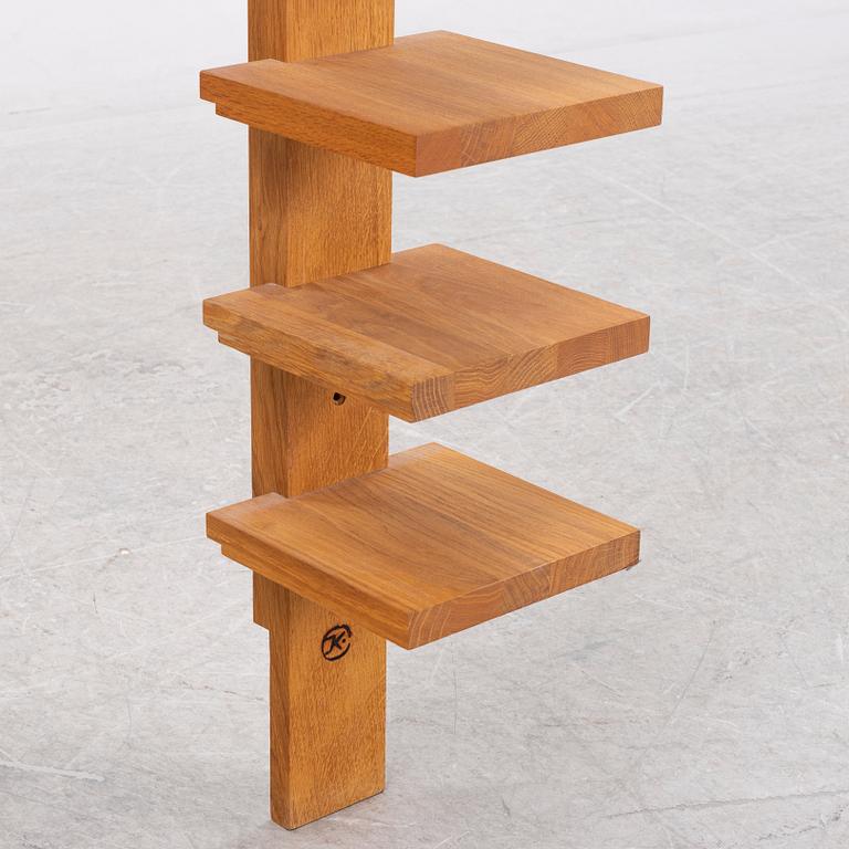 A 'Pilaster' shelf by John Kandell for Källemo, designed 1989.
