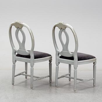 Eight second half of the 20th century Gustavian style chairs.