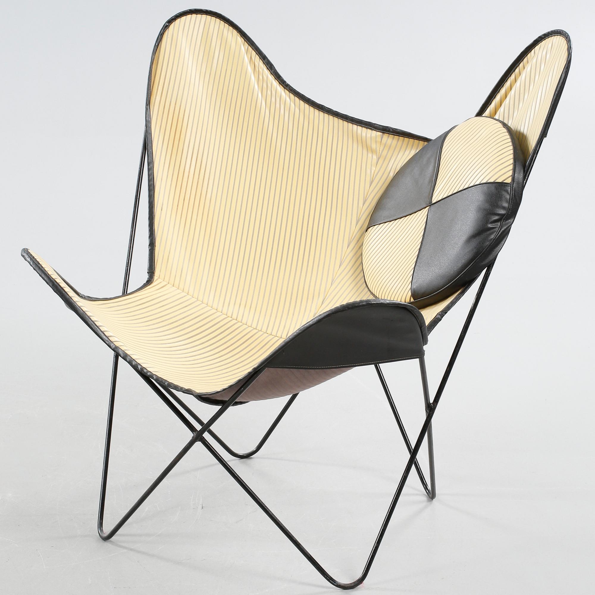 A chair, so called bat chair, made in the mid 20th century.