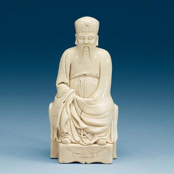 1677. A blanc de chine figure of a deity, Qing dynasty, 17th Century.