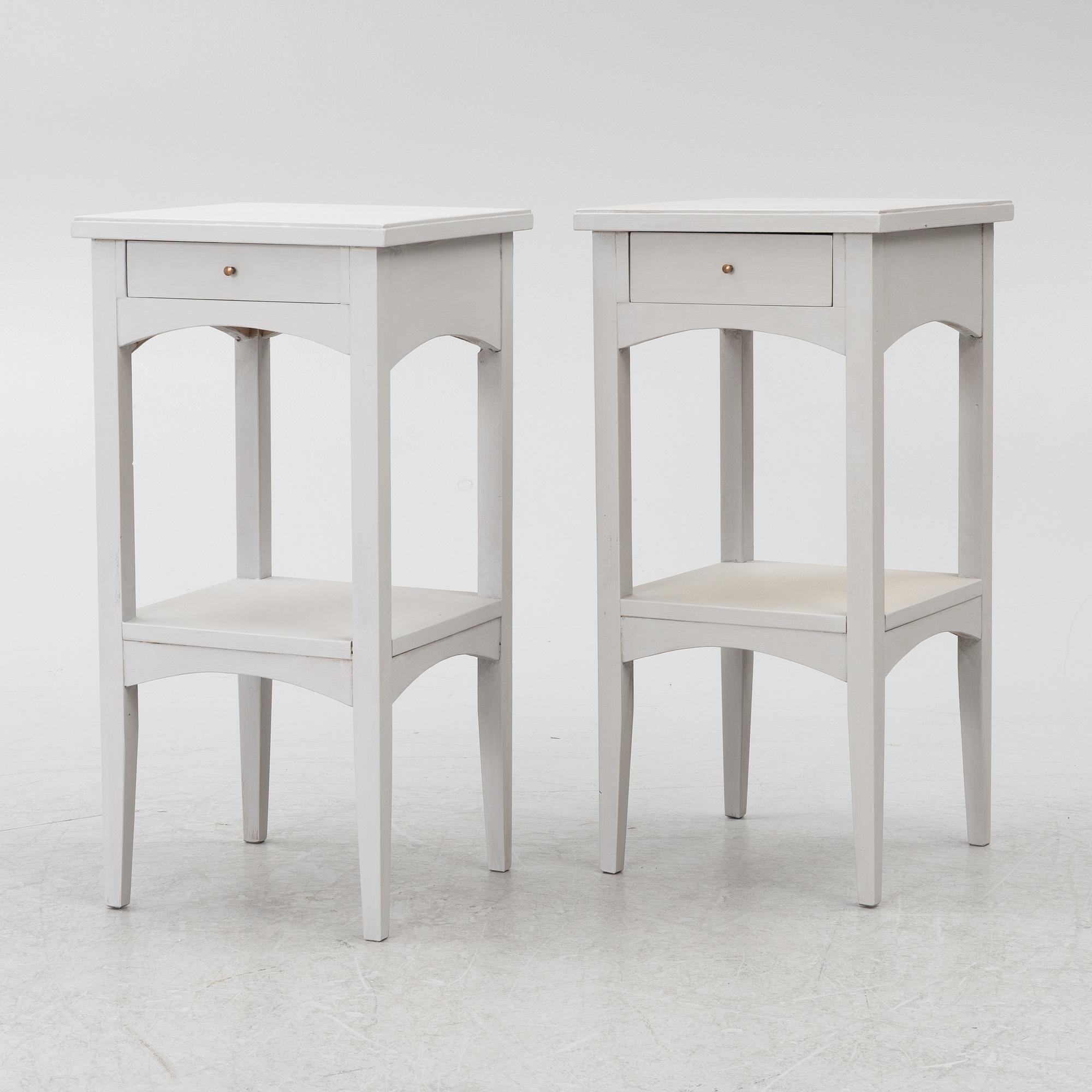 A pair of night stands, circa 1900.