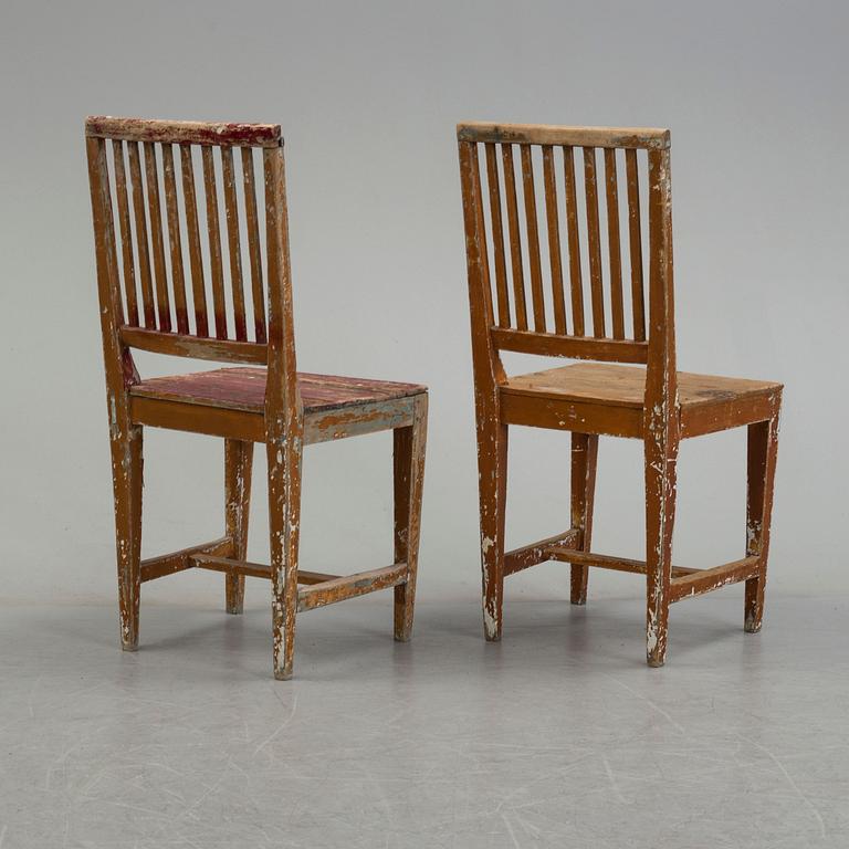 Five painted pine chairs, 19th Century.