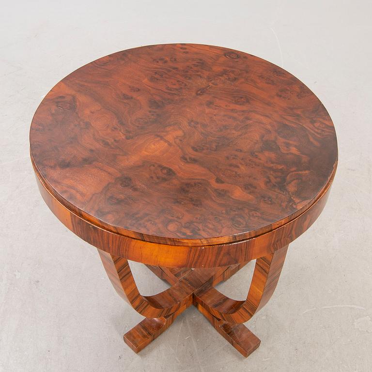 An Art Deco walnut coffee table first half of the 20th century.
