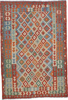 A RUG, kilim, ca 251 x 173 cm.