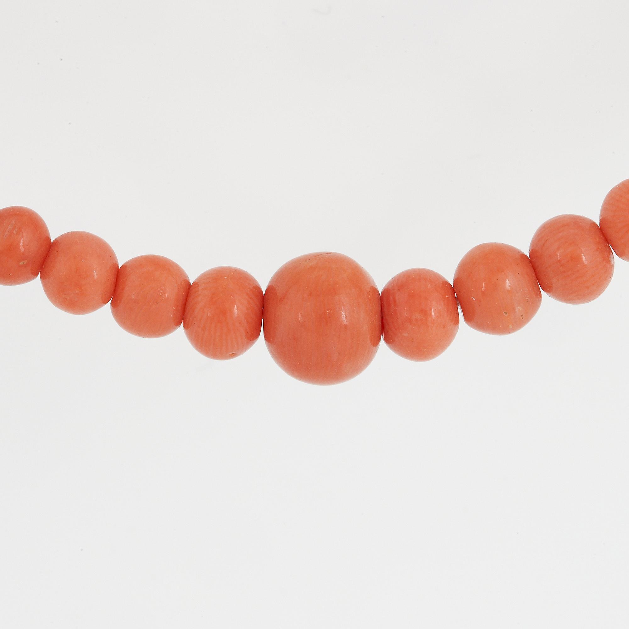 Coral bead necklace.