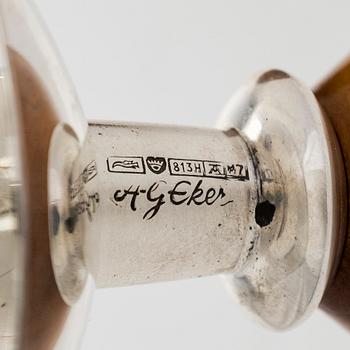 Anna-Greta Eker, a pair of silver and mahogny candlesticks, Auran Kultaseppä, Turku 1965.