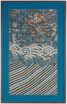 A textile fragment of a Chinese robe, Qing dynasty, 18th Century.