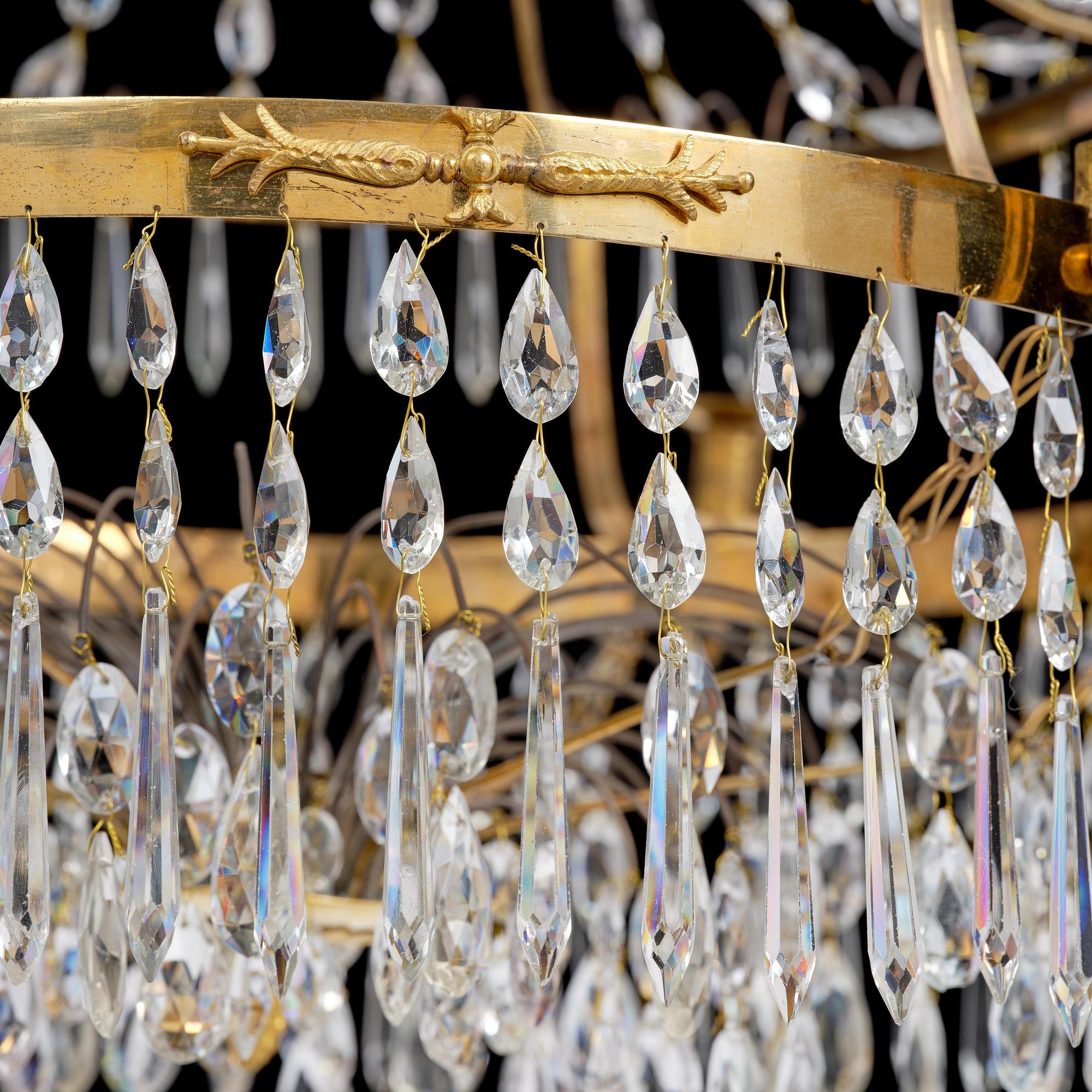 A late Gustavian gilt brass and cut glass seven-light chandelier, Stockholm, late 18th century.