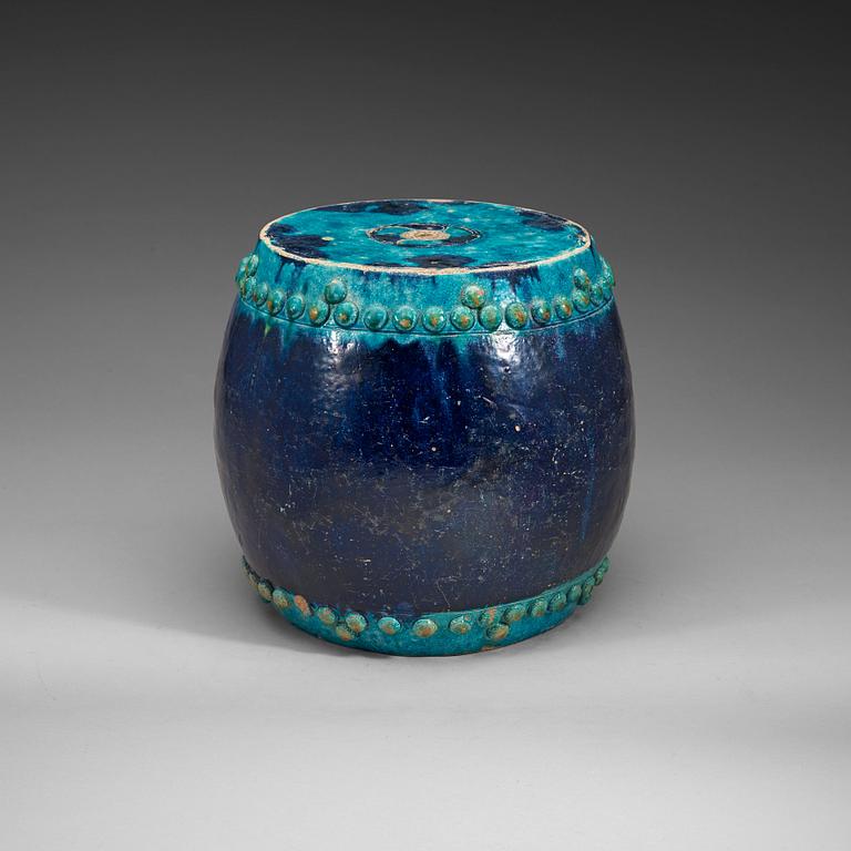 A turkoise and purple glazed garden seat, Ming dynasty, 17th Century.