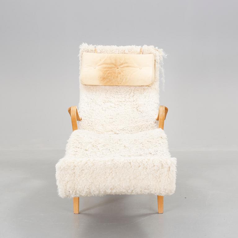 LIGGFÅTÖLJ, "Pernilla", brännmärkt Bruno Mathsson design.