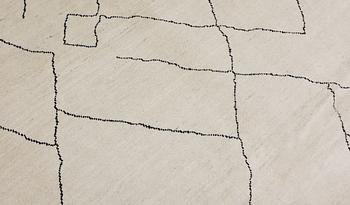 A Moroccan carpet, approx. 303 x 202 cm.