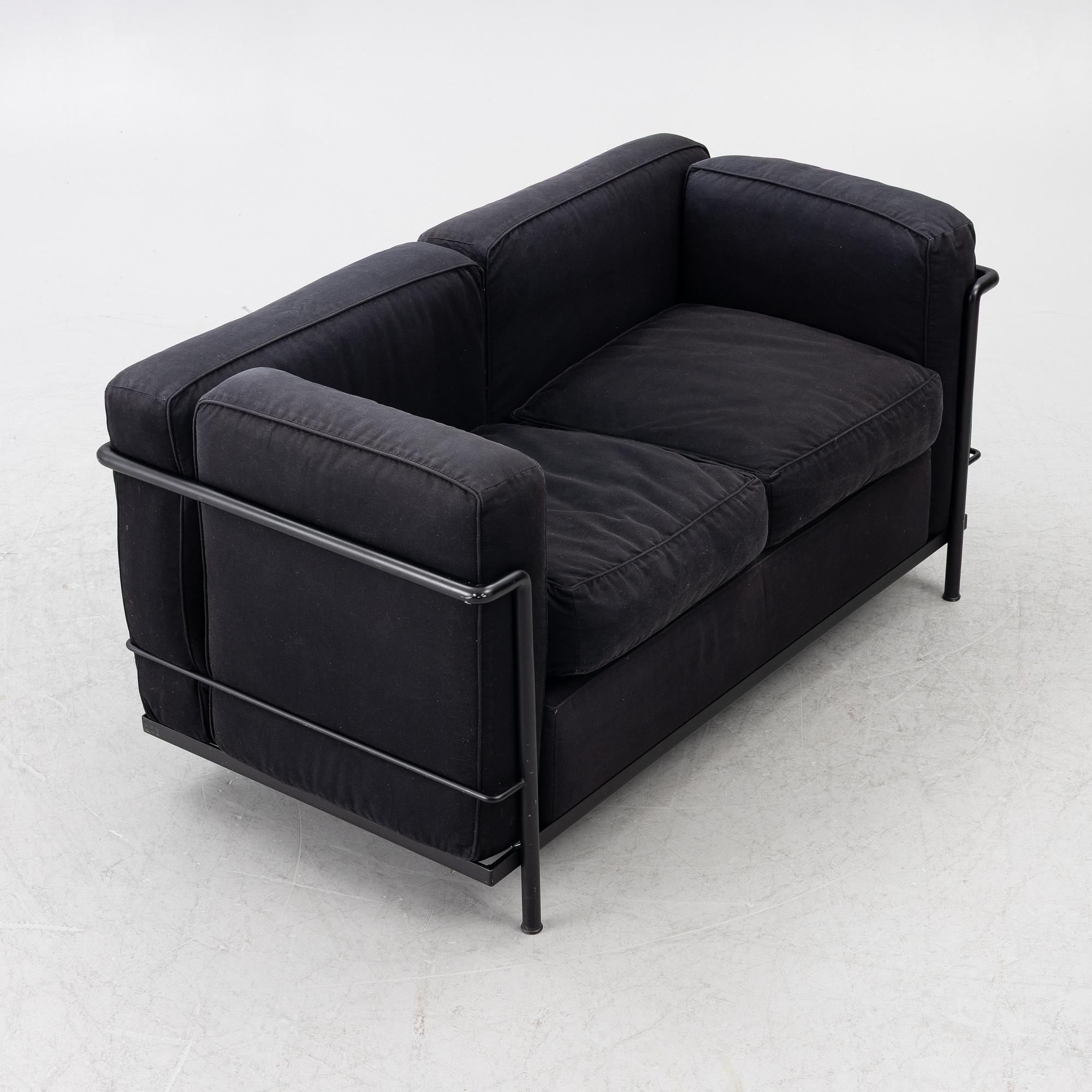 Pierre Jeanneret, Charlotte Perriand & Le Corbusier, an 'LC 2' sofa, Cassina, Italy.