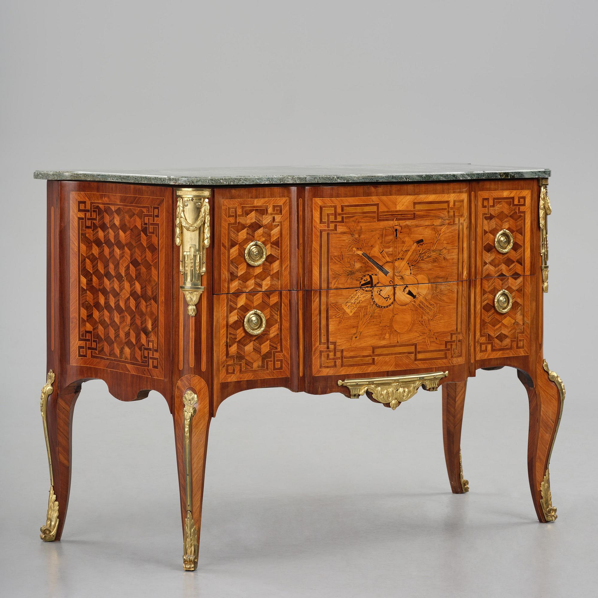 A Louis XVI rosewood and amaranth marquetry ormolu-mounted commode by Leonard Boudin (master in Paris 1761).