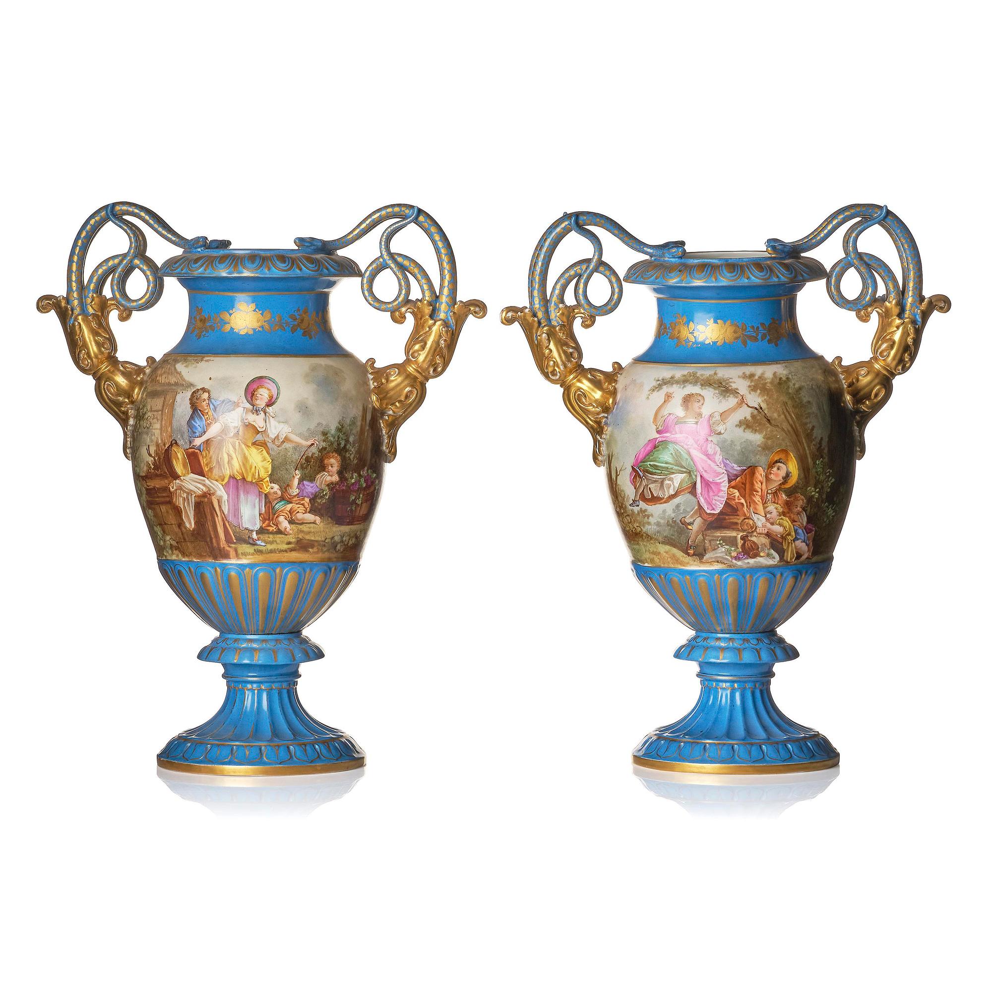 A pair of large porcelain urns, Sèvres like mark, around 1900.